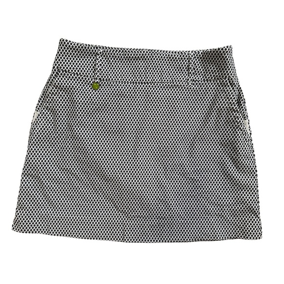 Swing Control Black and White Patterned Athletic Skirt with Built-In Shorts - Picture 1 of 11